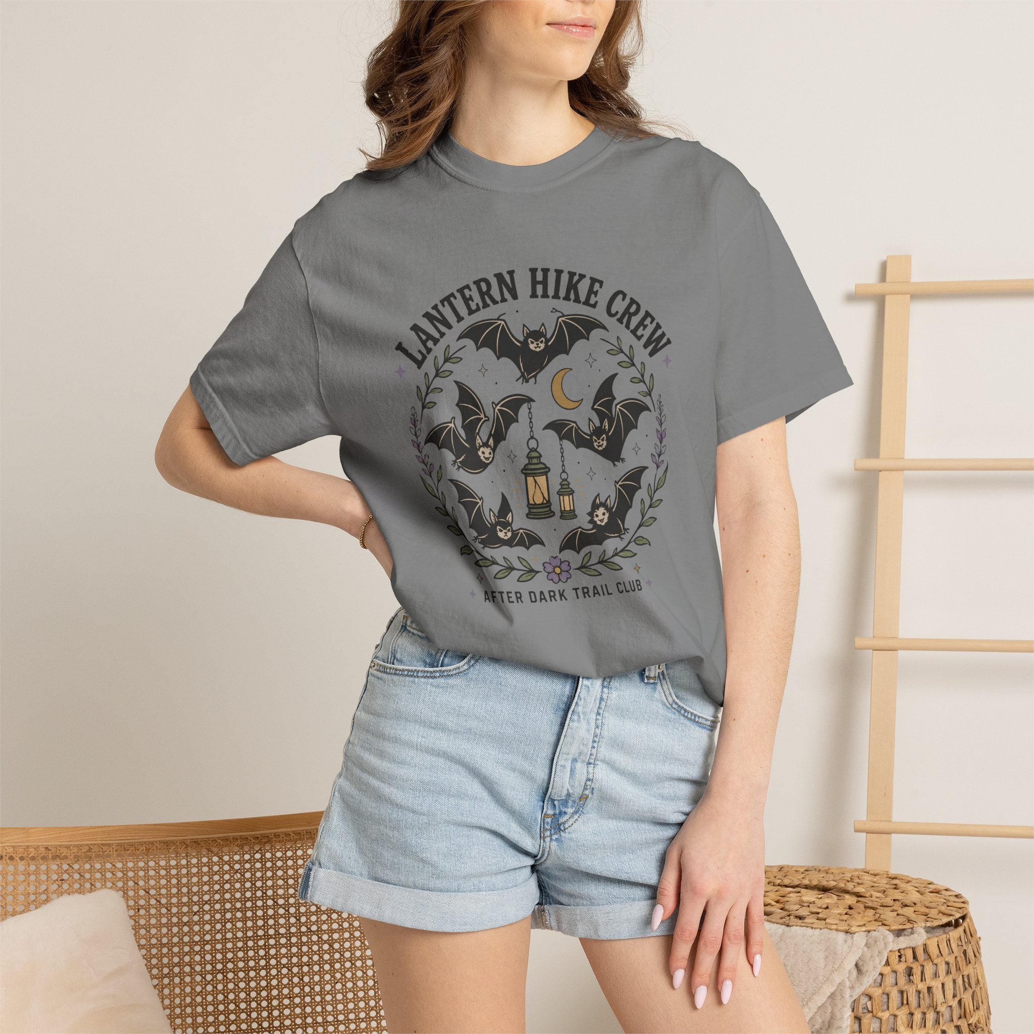 Grey Comfort Colors t-shirt featuring a lantern glowing on a switchback trail under the moon, Trail & Ember Co.