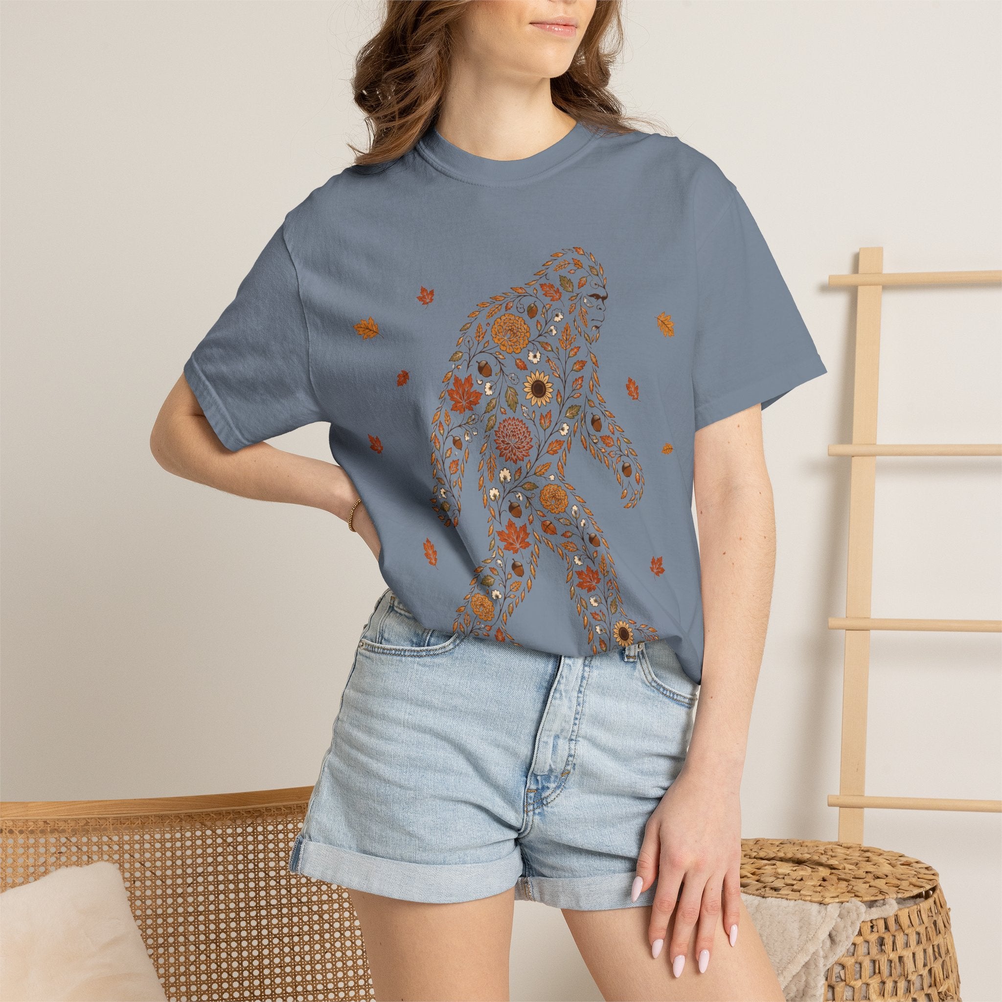 Close-up of the Autumn Big Foot print design on a Blue Jean Comfort Colors t-shirt