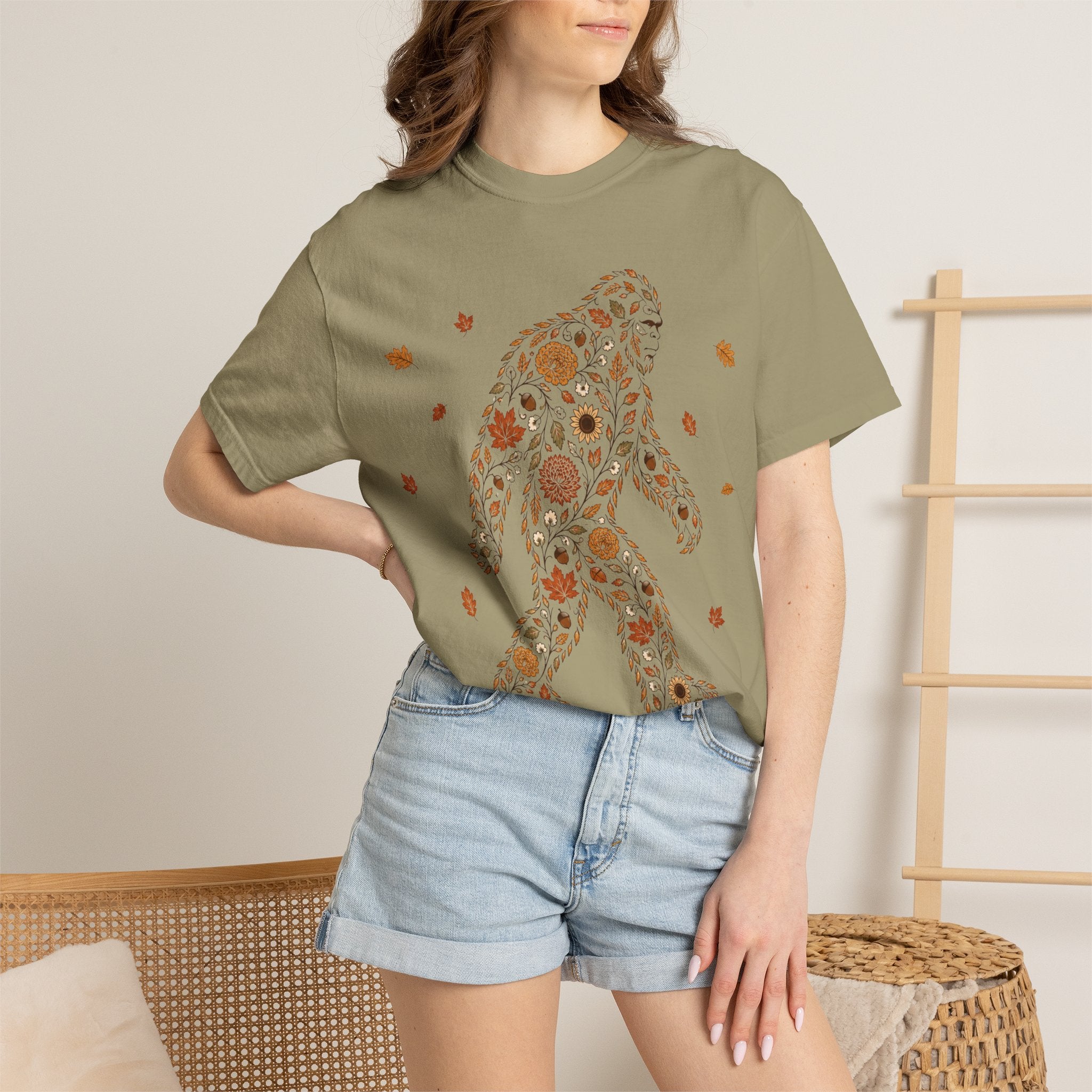 Close-up of the Autumn Big Foot print design on a Khaki Comfort Colors t-shirt