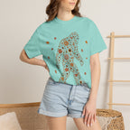 Close-up of the Autumn Big Foot print design on a Chalky Mint Comfort Colors t-shirt