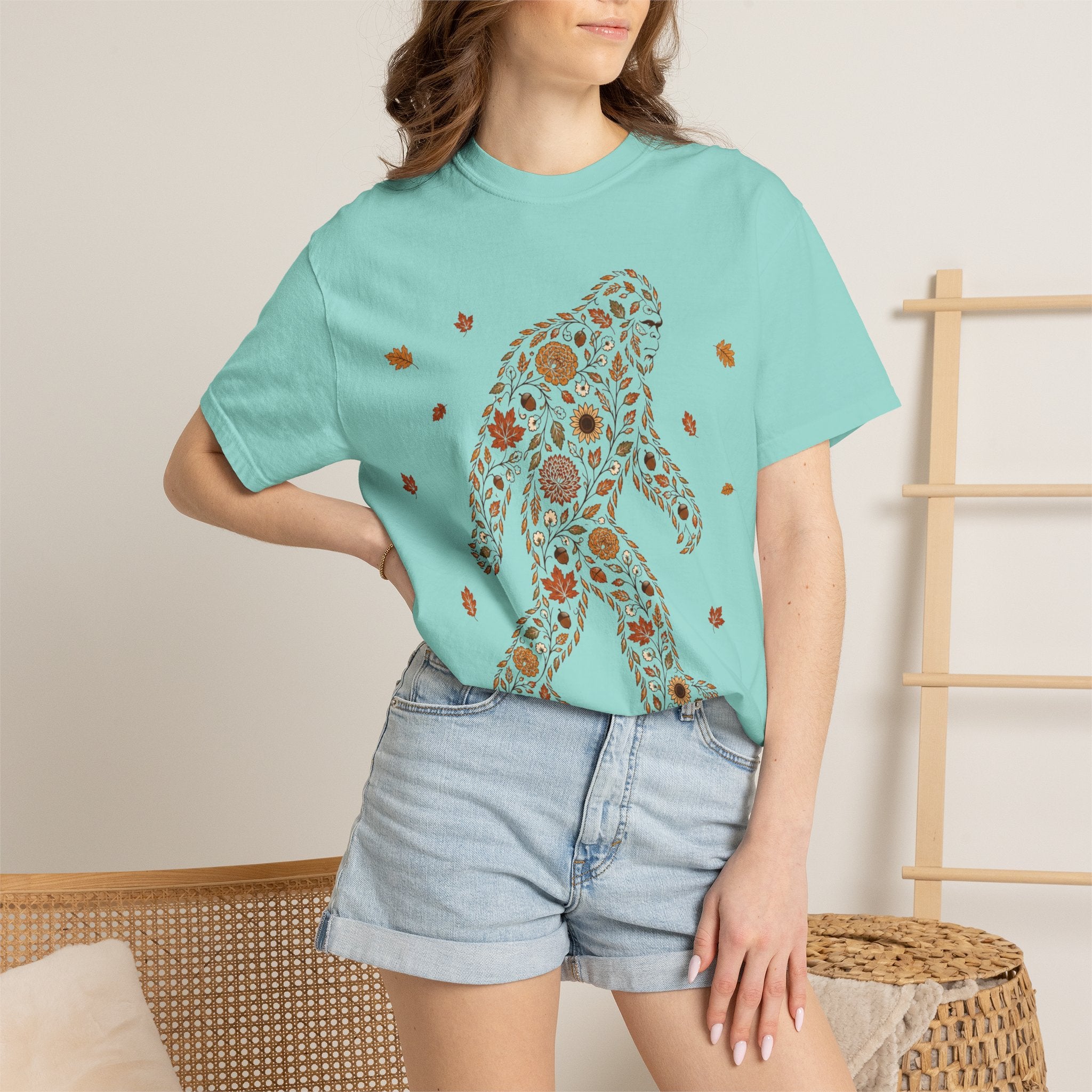 Close-up of the Autumn Big Foot print design on a Chalky Mint Comfort Colors t-shirt