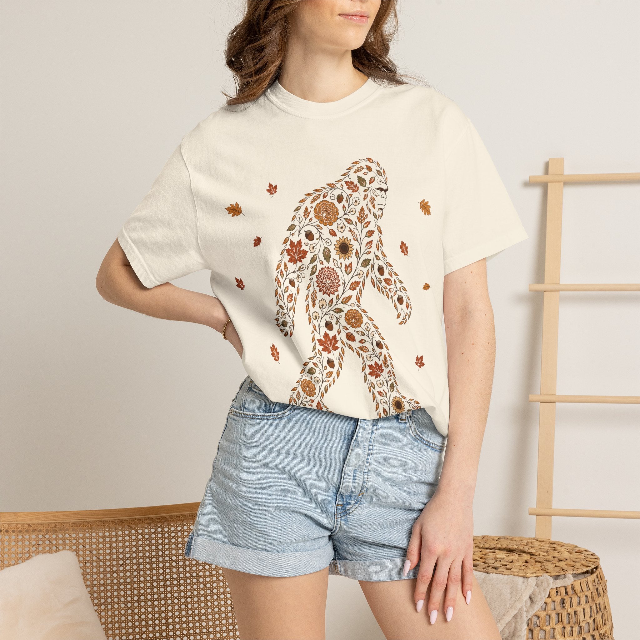 Close-up of the Autumn Big Foot print design on an Ivory Comfort Colors t-shirt