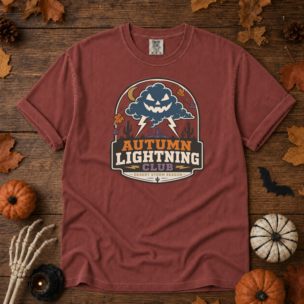 Brick Comfort Colors t-shirt featuring lightning splitting the sky over a lone saguaro with storm clouds rolling across the desert, Trail & Ember Co.