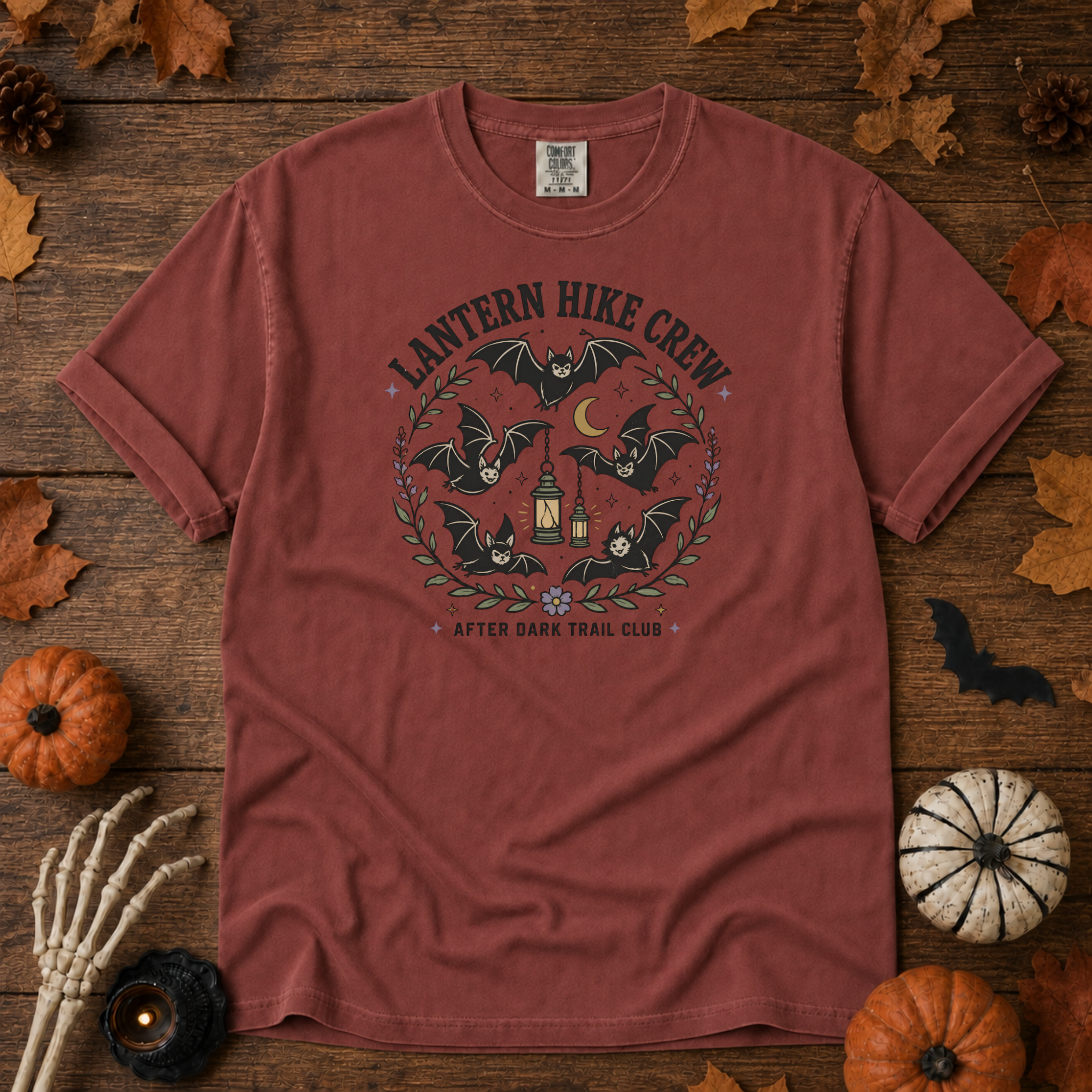 Brick Comfort Colors t-shirt featuring a lantern glowing on a switchback trail under the moon, Trail & Ember Co.