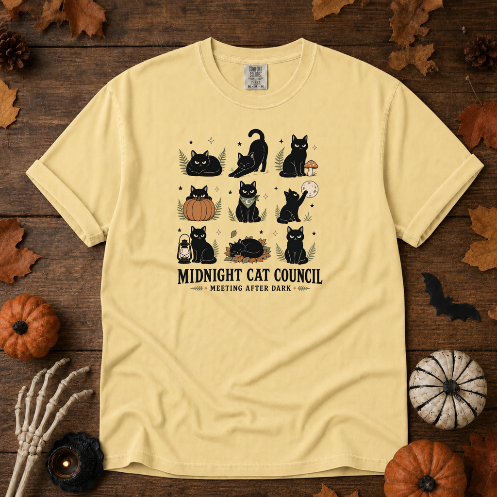 Butter Comfort Colors t-shirt featuring a circle of cats on a fence line at midnight with eyes catching the porch light, Trail & Ember Co.