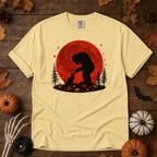 Butter Comfort Colors t-shirt featuring Bigfoot booping a black cat's nose in front of a red autumn moon, with maple leaves and pine trees, Trail & Ember Co.