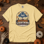 Butter Comfort Colors t-shirt featuring lightning splitting the sky over a lone saguaro with storm clouds rolling across the desert, Trail & Ember Co.