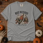 Grey Comfort Colors t-shirt featuring a skeleton wrapped head to rib in fleece, propped against a lantern, Trail & Ember Co.