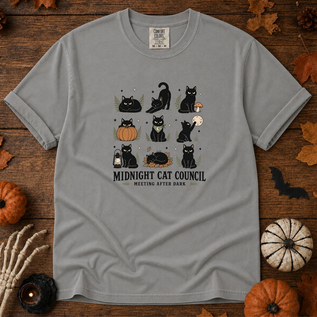 Grey Comfort Colors t-shirt featuring a circle of cats on a fence line at midnight with eyes catching the porch light, Trail & Ember Co.