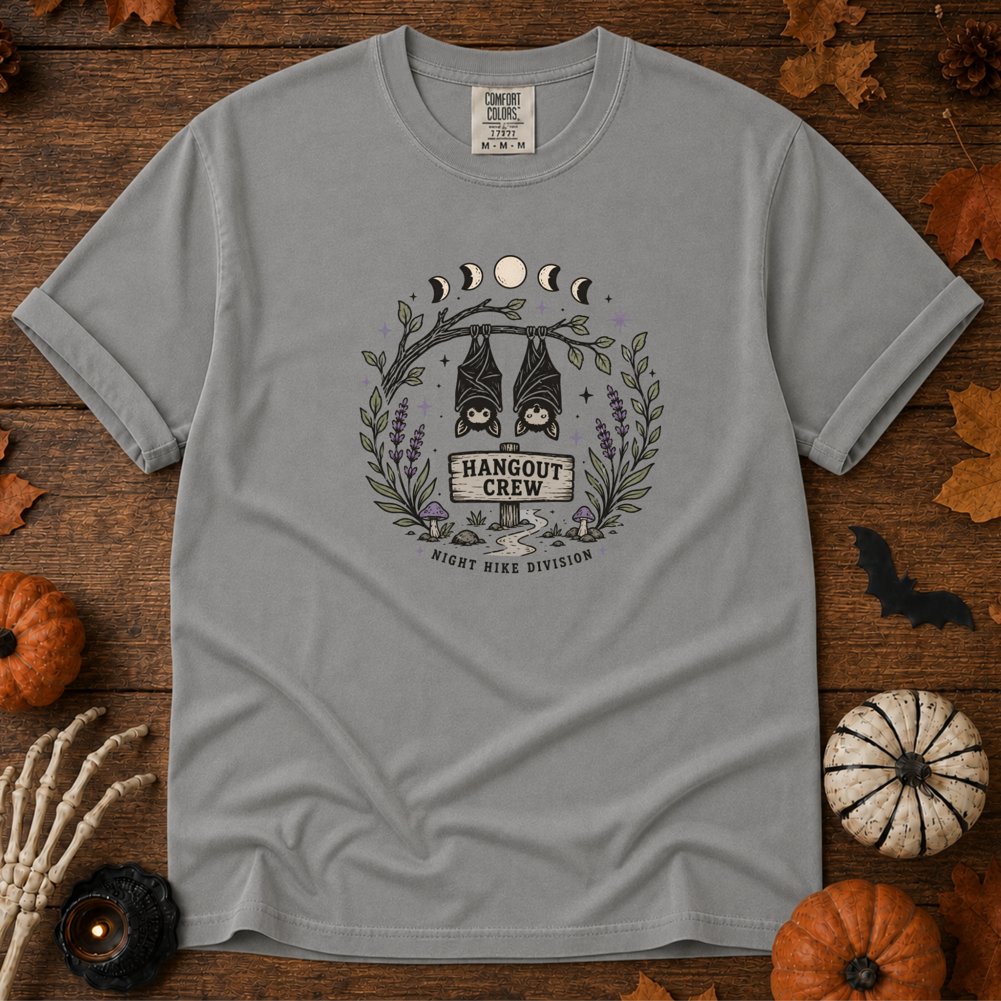 Grey Comfort Colors t-shirt featuring a hammock strung between two trees with boots kicked off underneath, Trail & Ember Co.
