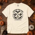 Ivory Comfort Colors t-shirt featuring a lantern glowing on a switchback trail under the moon, Trail & Ember Co.
