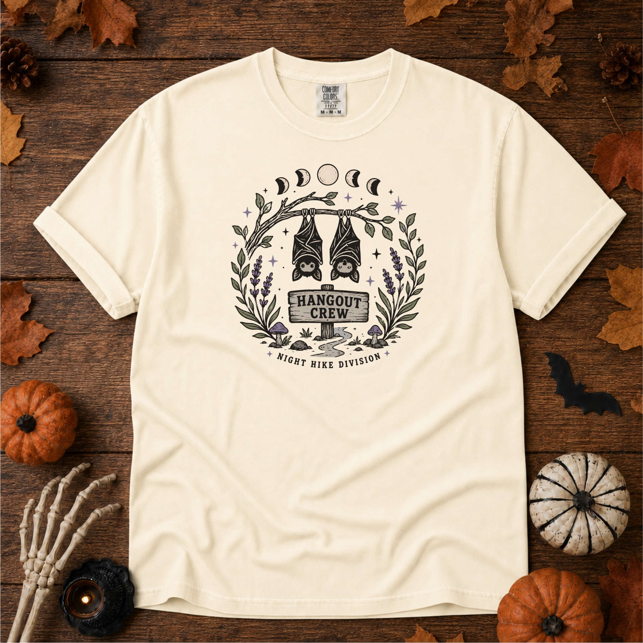 Ivory Comfort Colors t-shirt featuring a hammock strung between two trees with boots kicked off underneath, Trail & Ember Co.