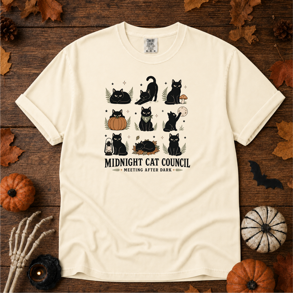 Ivory Comfort Colors t-shirt featuring a circle of cats on a fence line at midnight with eyes catching the porch light, Trail & Ember Co.