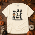 Ivory Comfort Colors t-shirt featuring a circle of cats on a fence line at midnight with eyes catching the porch light, Trail & Ember Co.