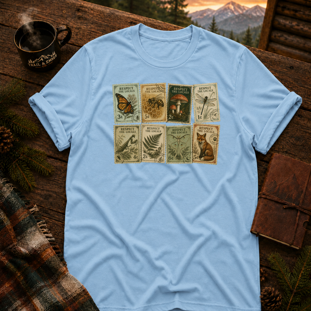 Light Blue Gildan 64000 t-shirt with Respect the Locals Vintage Stamps graphic — Trail & Ember Co. outdoor apparel