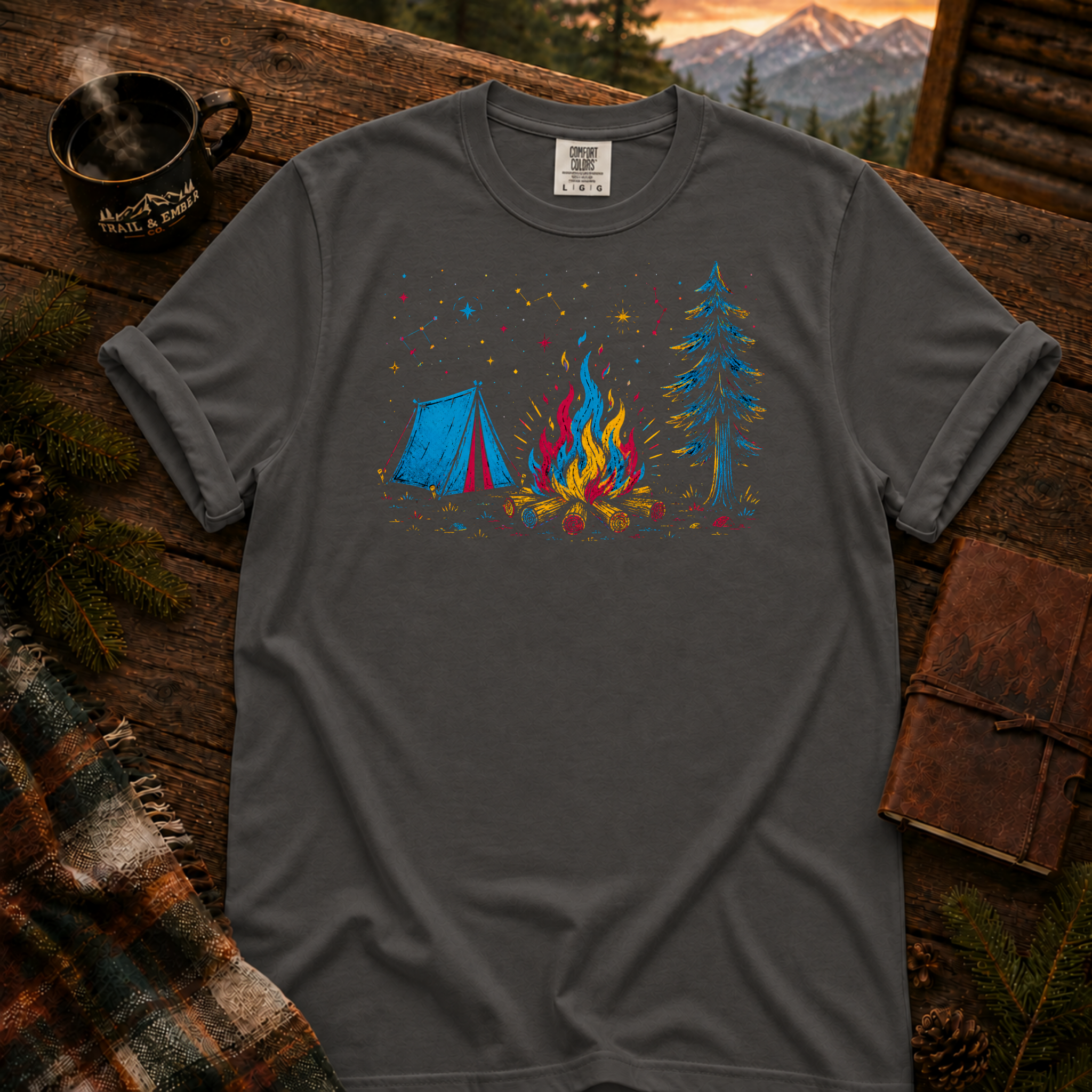 Pepper Comfort Colors t-shirt with a neon-lit campsite scene — tent, campfire, and stars in layered red, blue, and gold neon linework, Trail & Ember Co.