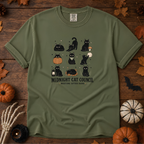 Sage Comfort Colors t-shirt featuring a circle of cats on a fence line at midnight with eyes catching the porch light, Trail & Ember Co.