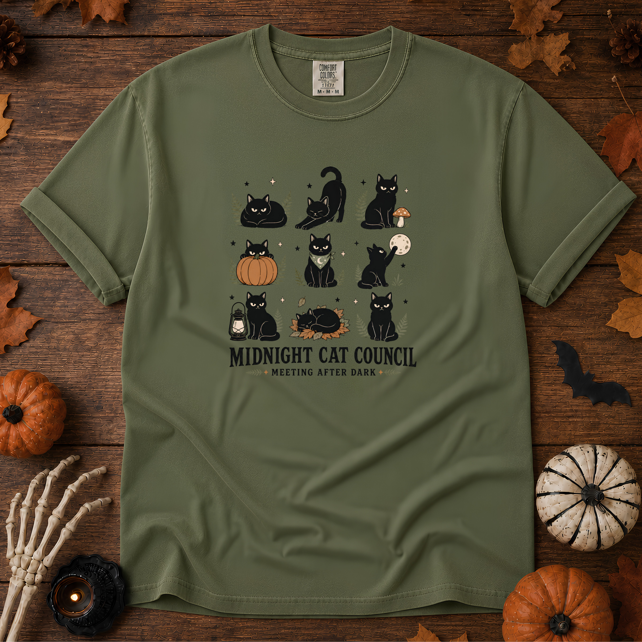 Sage Comfort Colors t-shirt featuring a circle of cats on a fence line at midnight with eyes catching the porch light, Trail & Ember Co.