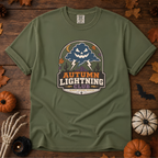 Sage Comfort Colors t-shirt featuring lightning splitting the sky over a lone saguaro with storm clouds rolling across the desert, Trail & Ember Co.