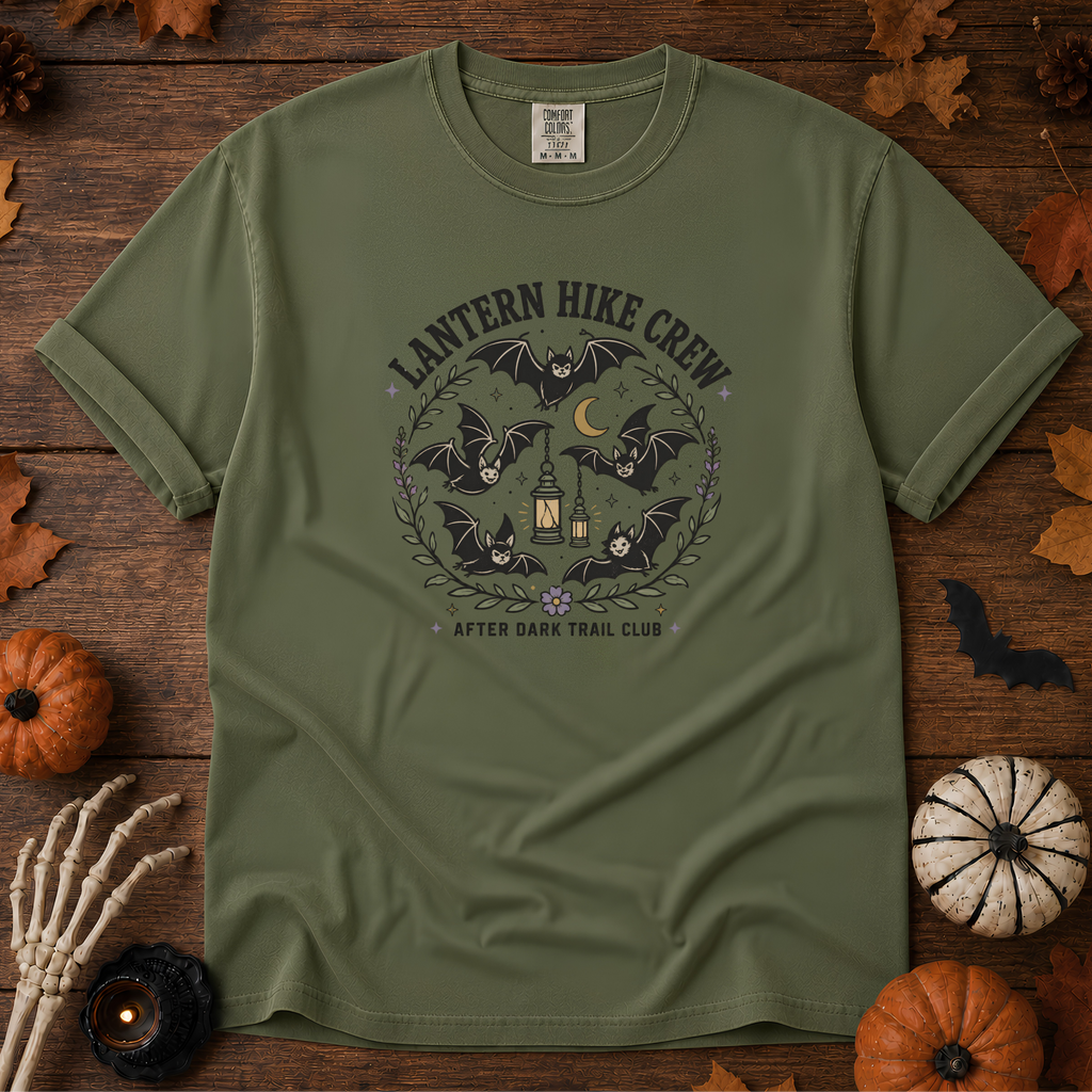 Sage Comfort Colors t-shirt featuring a lantern glowing on a switchback trail under the moon, Trail & Ember Co.