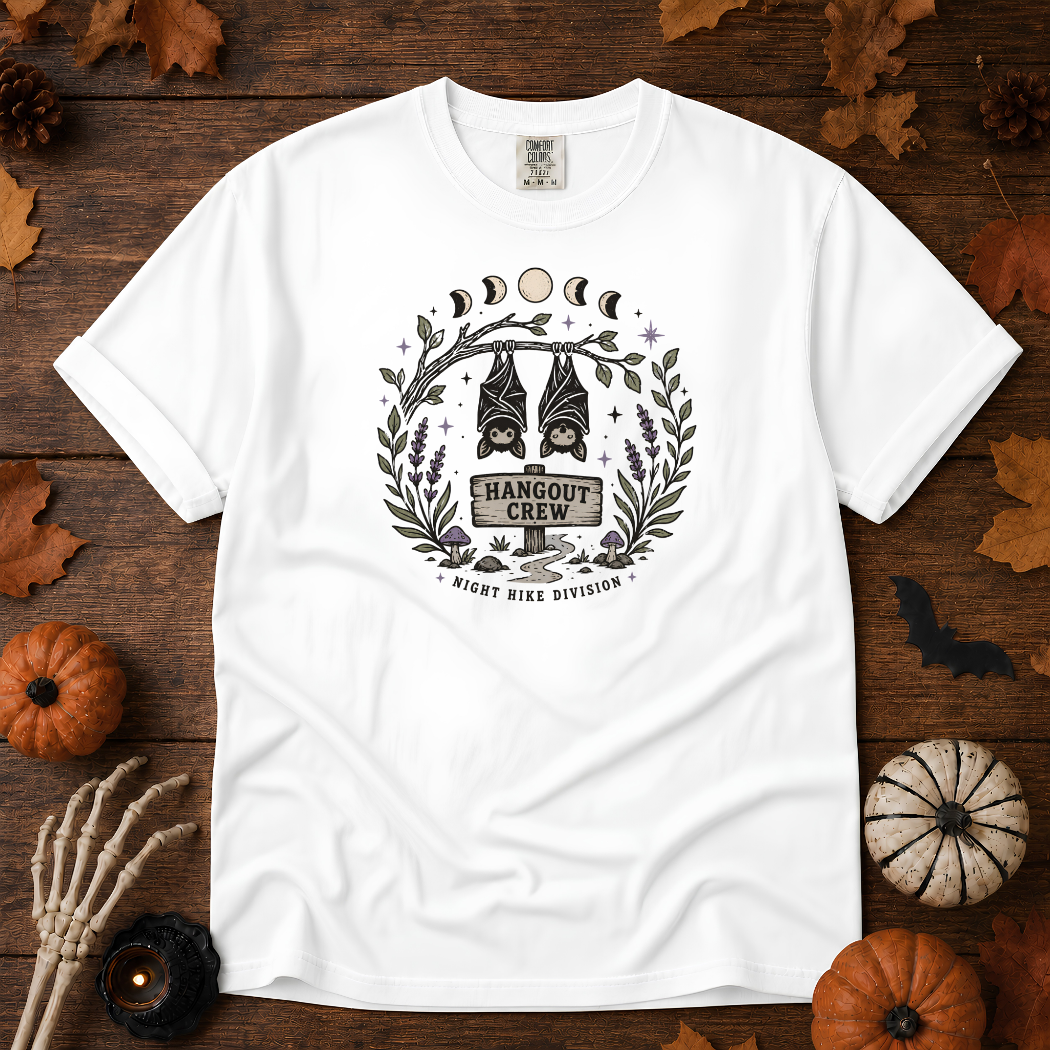 White Comfort Colors t-shirt featuring a hammock strung between two trees with boots kicked off underneath, Trail & Ember Co.