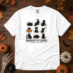 White Comfort Colors t-shirt featuring a circle of cats on a fence line at midnight with eyes catching the porch light, Trail & Ember Co.