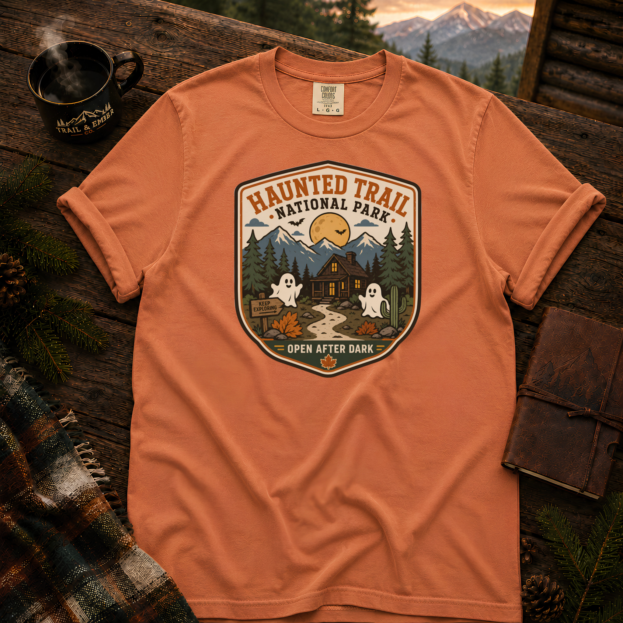Haunted Trail National Park t-shirt in Yam — vintage Halloween badge design