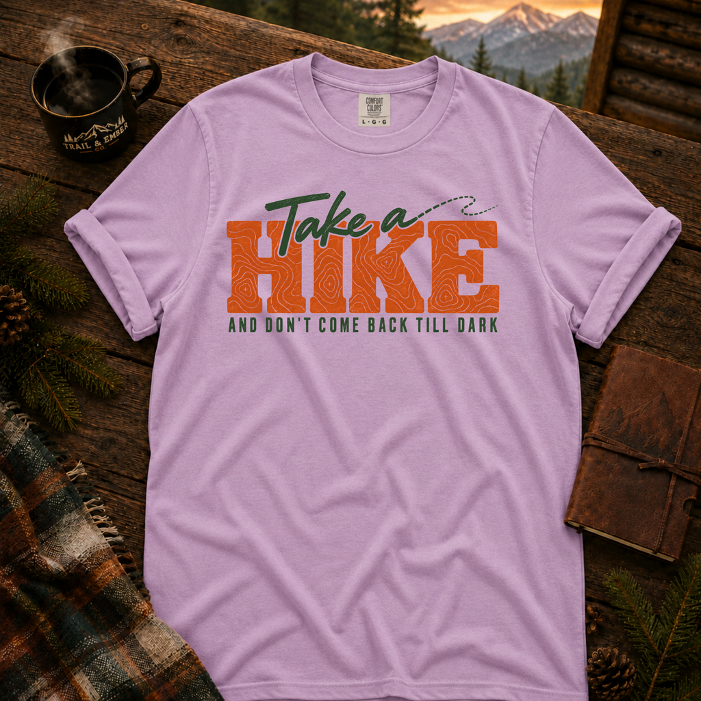 Orchid Comfort Colors T-shirt with Take a Hike topo lettering and And Don't Come Back Till Dark slogan.