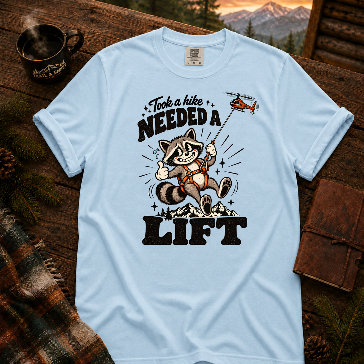 Chambray Comfort Colors T-shirt with Took a Hike, Needed a Lift raccoon and rescue helicopter design.
