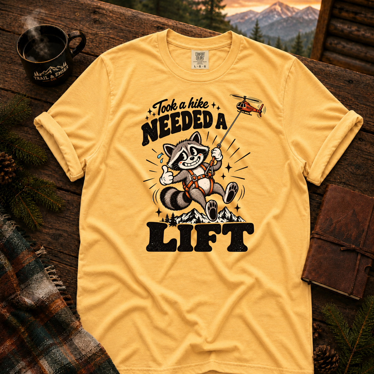Citrus Comfort Colors T-shirt with Took a Hike, Needed a Lift raccoon and rescue helicopter design.